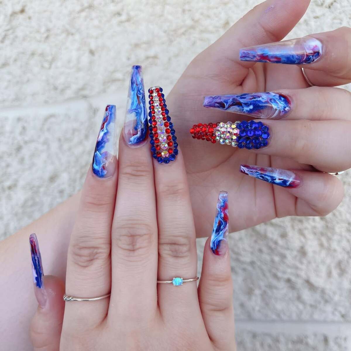 1. Patriotic Glam with Rhinestones and Marble Swirls