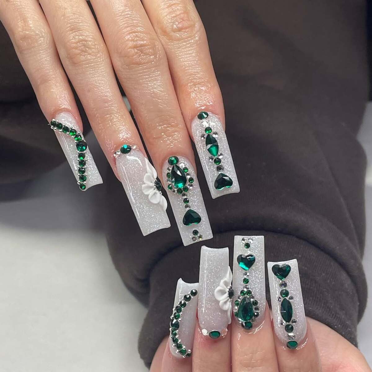 17. Emerald Elegance with Glitter and Florals