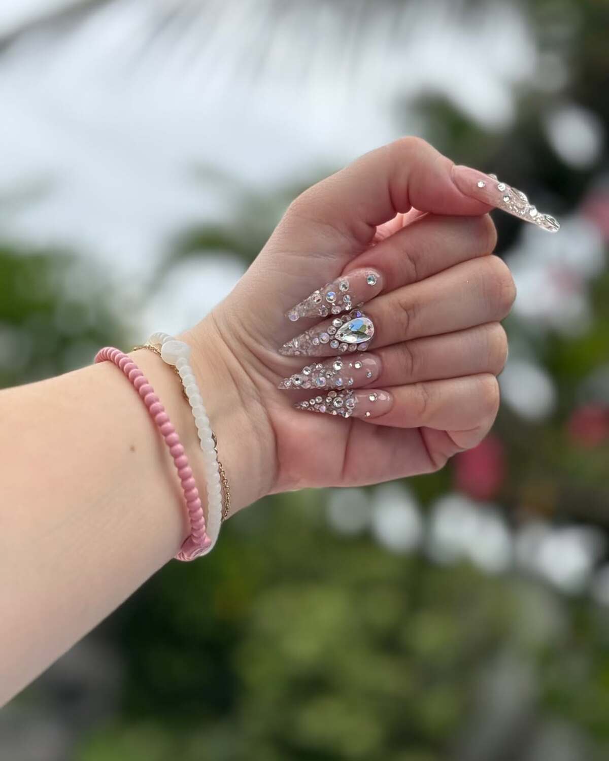 24. Crystal Clear Sparkle on Stiletto Nails