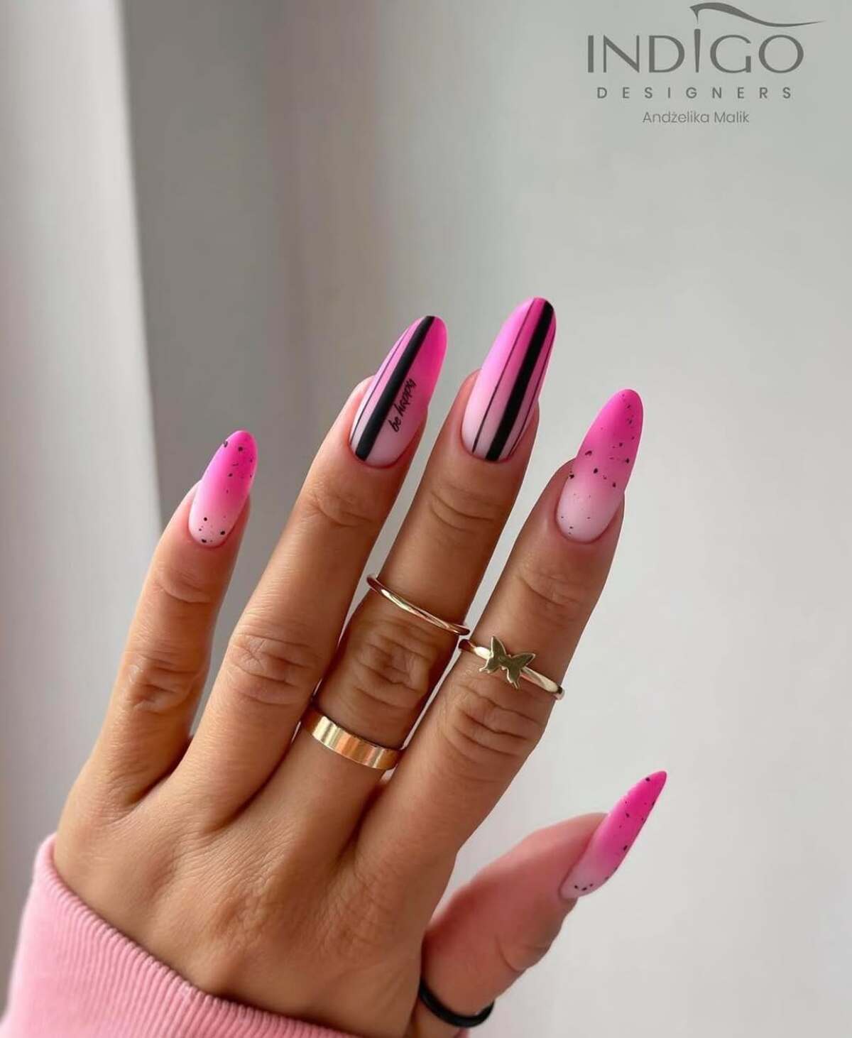 13. Neon Pink French Tips with Bold Black Stripes