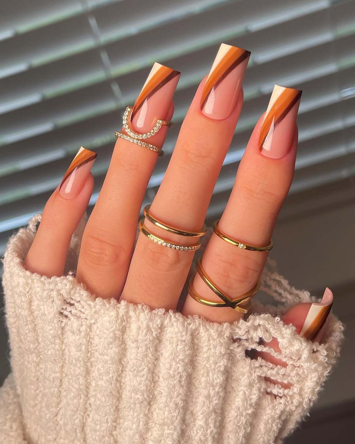 10. Warm Neutrals with a Twist of Orange