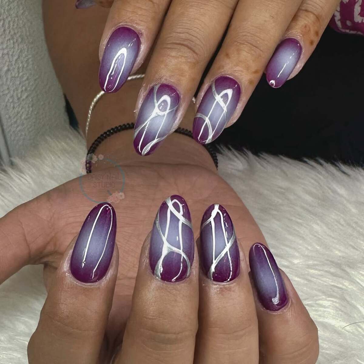 21. Deep Purple Ombre with Abstract White Swirls