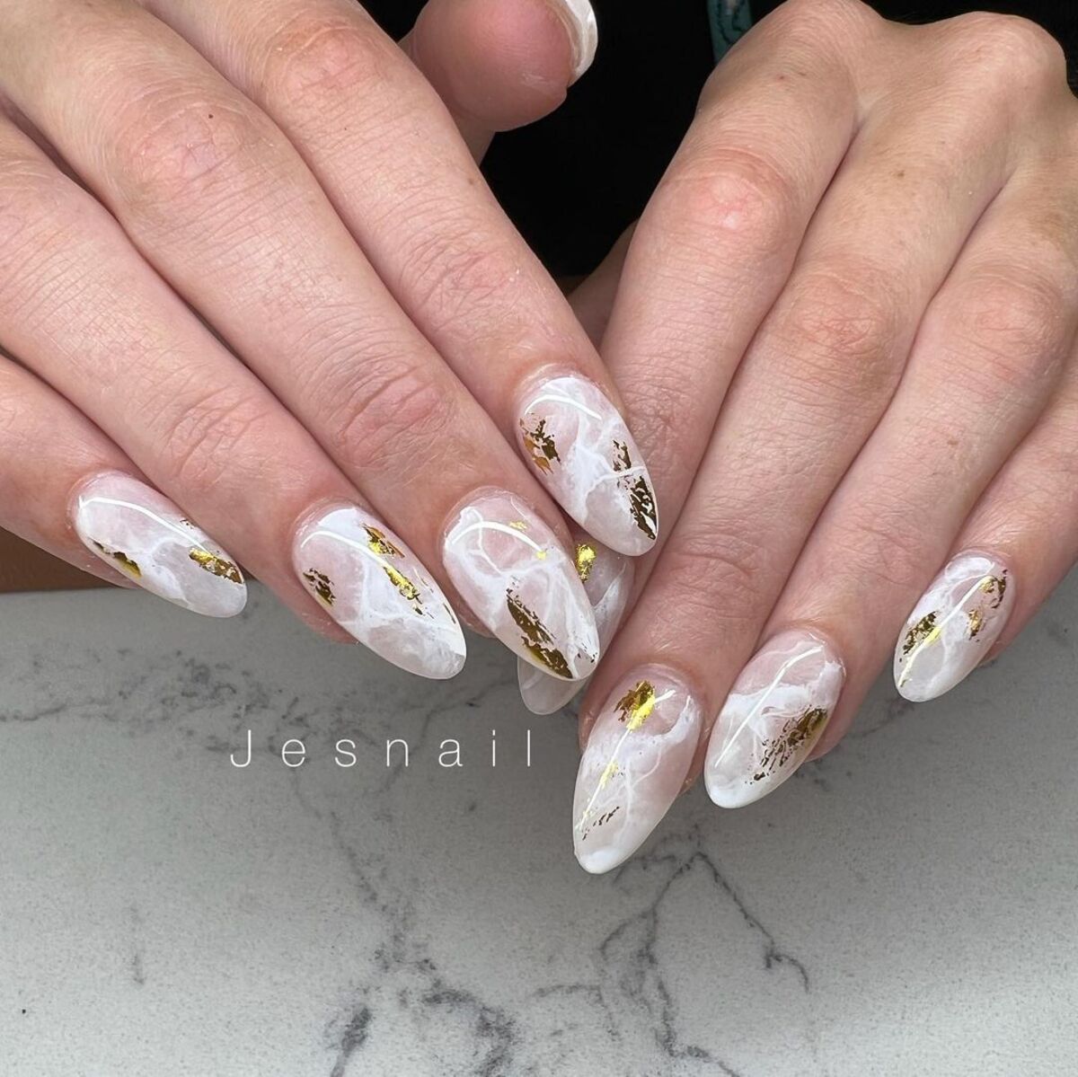 3. Marble and Gold Elegance