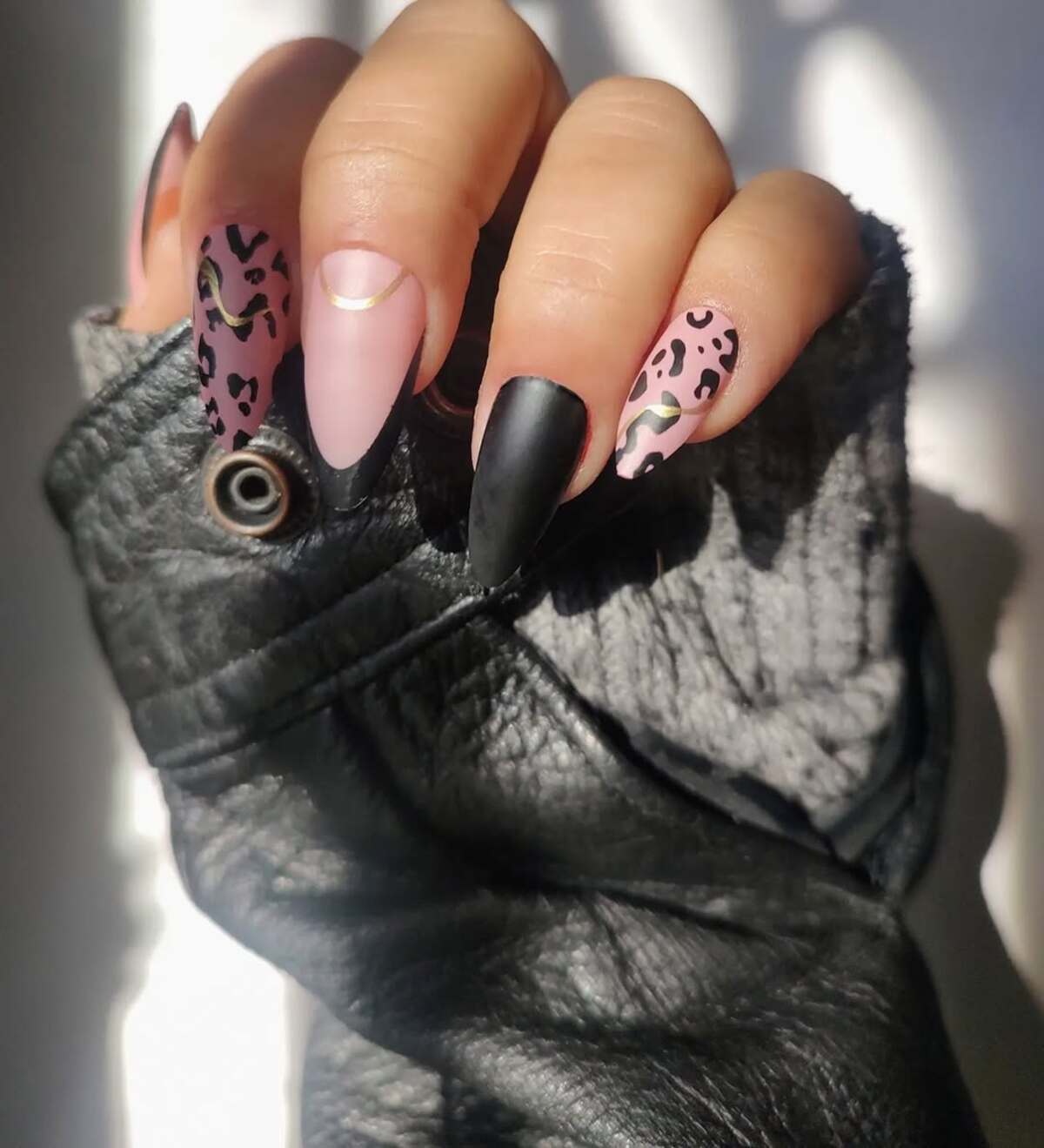 7. Edgy Matte Black with Leopard Accents