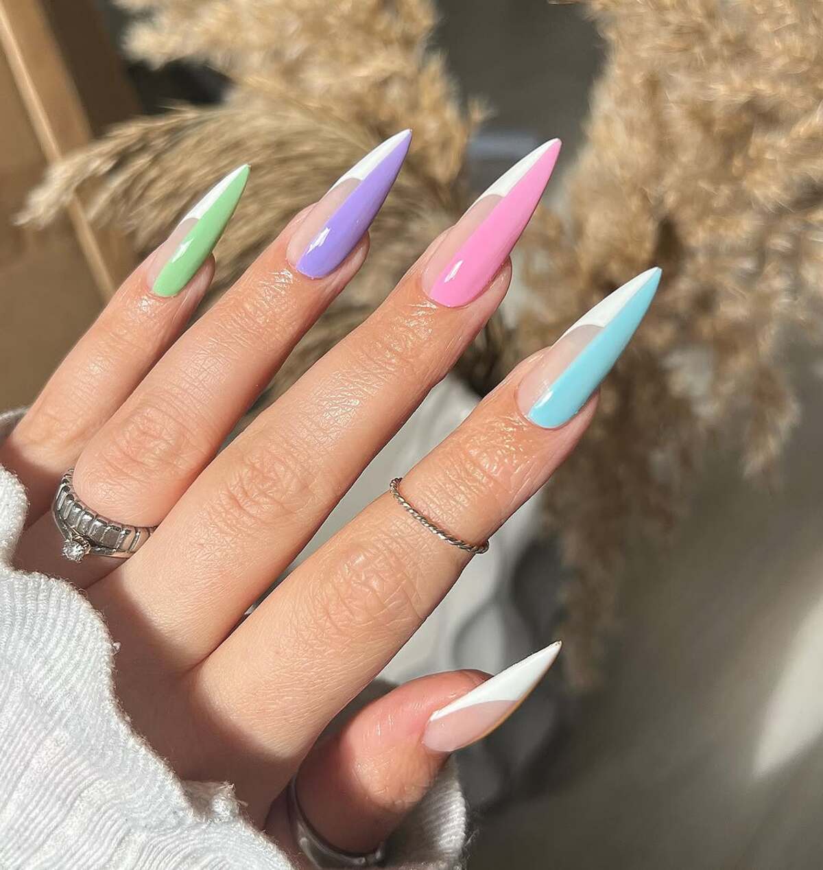 15. Pastel French Tips with a Sharp Edge