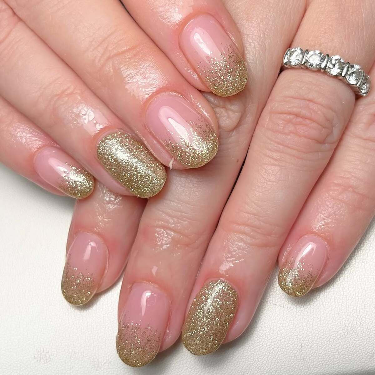 11. Delicate Gold Glitter Fade