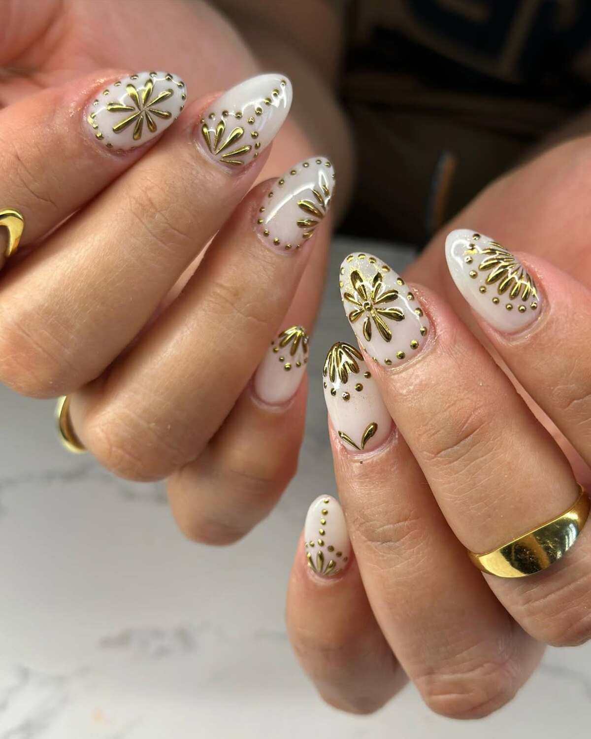 21. Intricate Gold Floral Accents