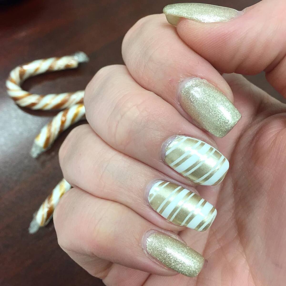 25. Festive Gold Candy Stripes