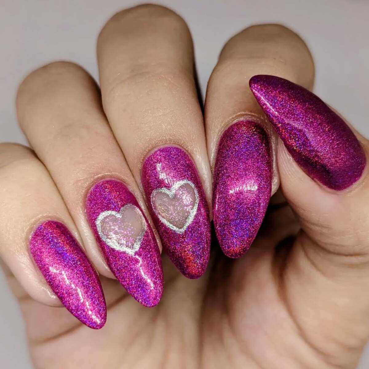 21. Holographic Pink Hearts on a Metallic Base