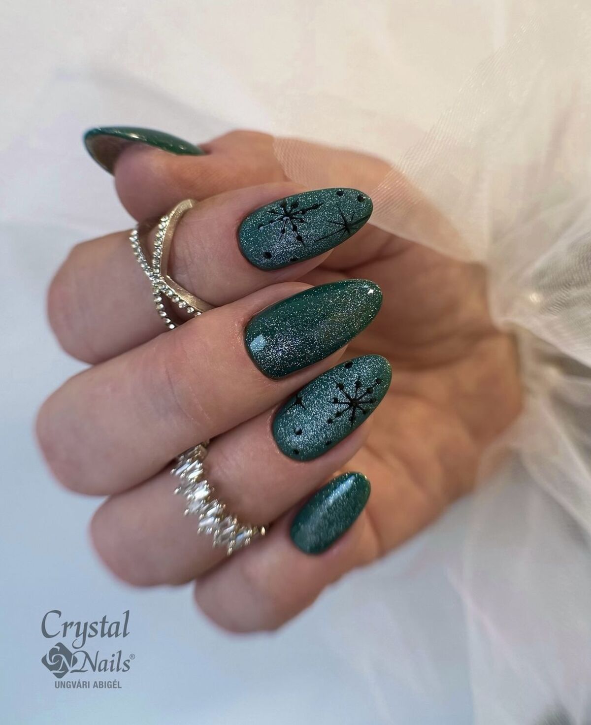 22. Emerald Green Glitter with Subtle Snowflakes