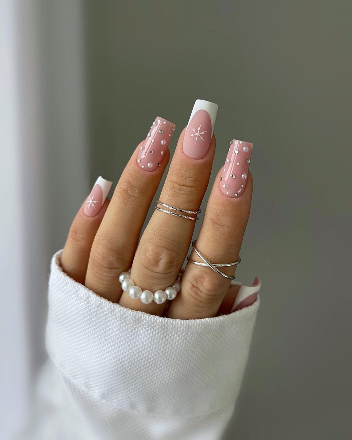 5. Soft Pink French Tips with Pearl Embellishments