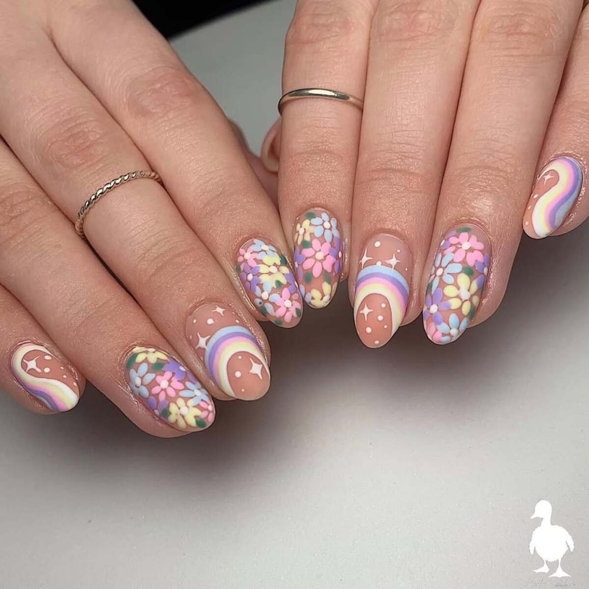 19. Rainbow Pastels with Floral and Starry Touches