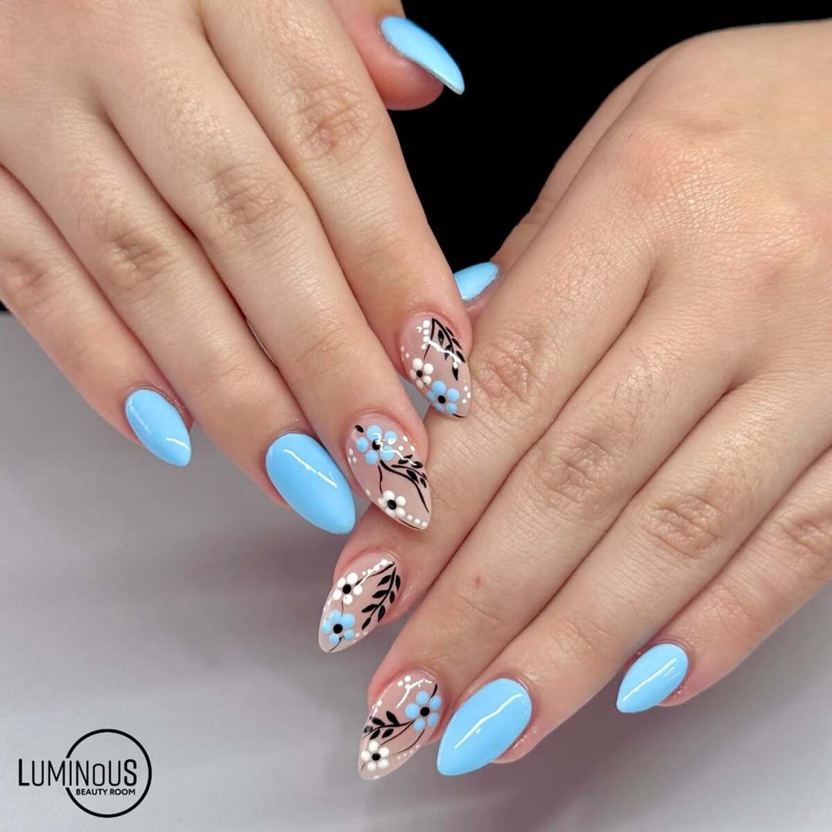 23. Sky Blue Elegance with Floral Details