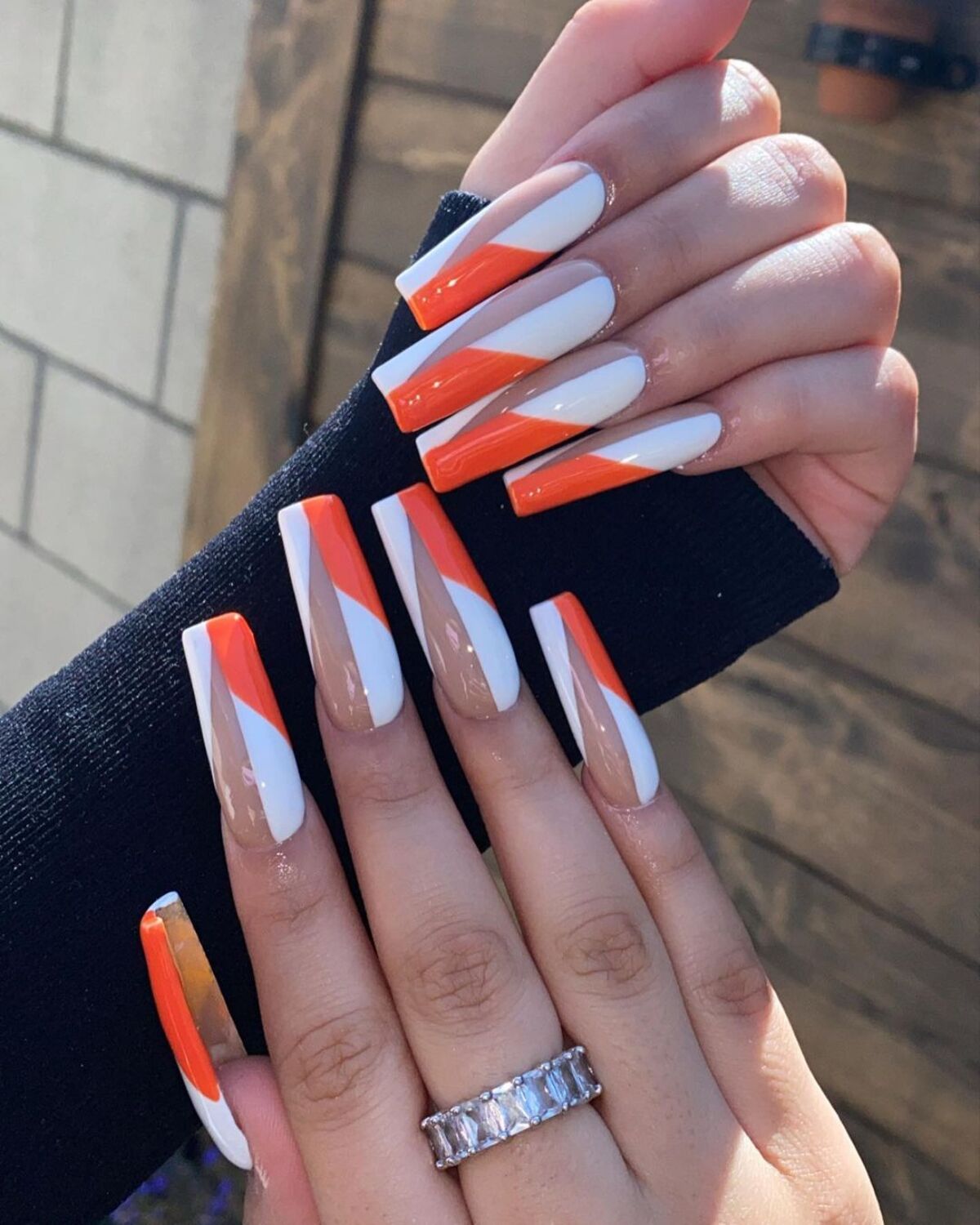 21. Fiery Orange and White Geometric Design