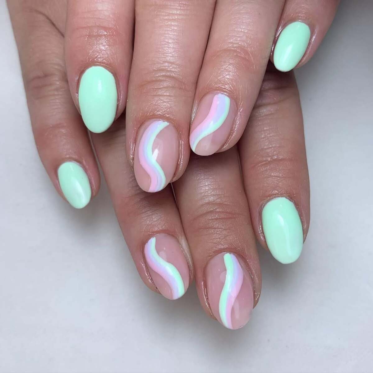 2. Pastel Green Meets Soft Rainbow Waves