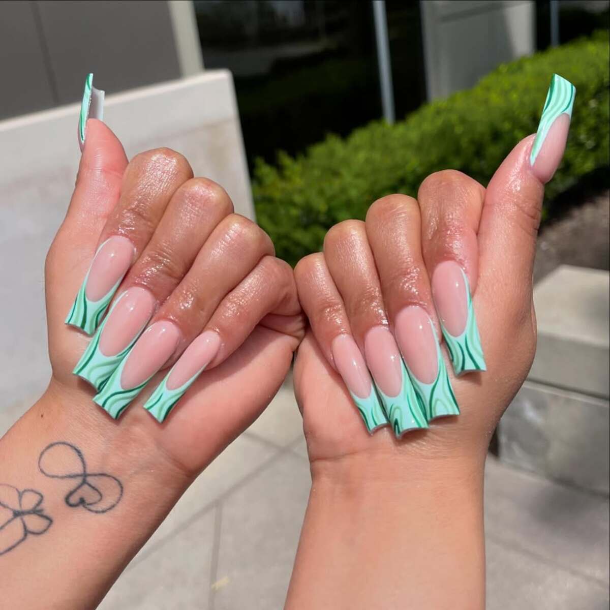 21. Abstract Wave French Tips in Mint Green