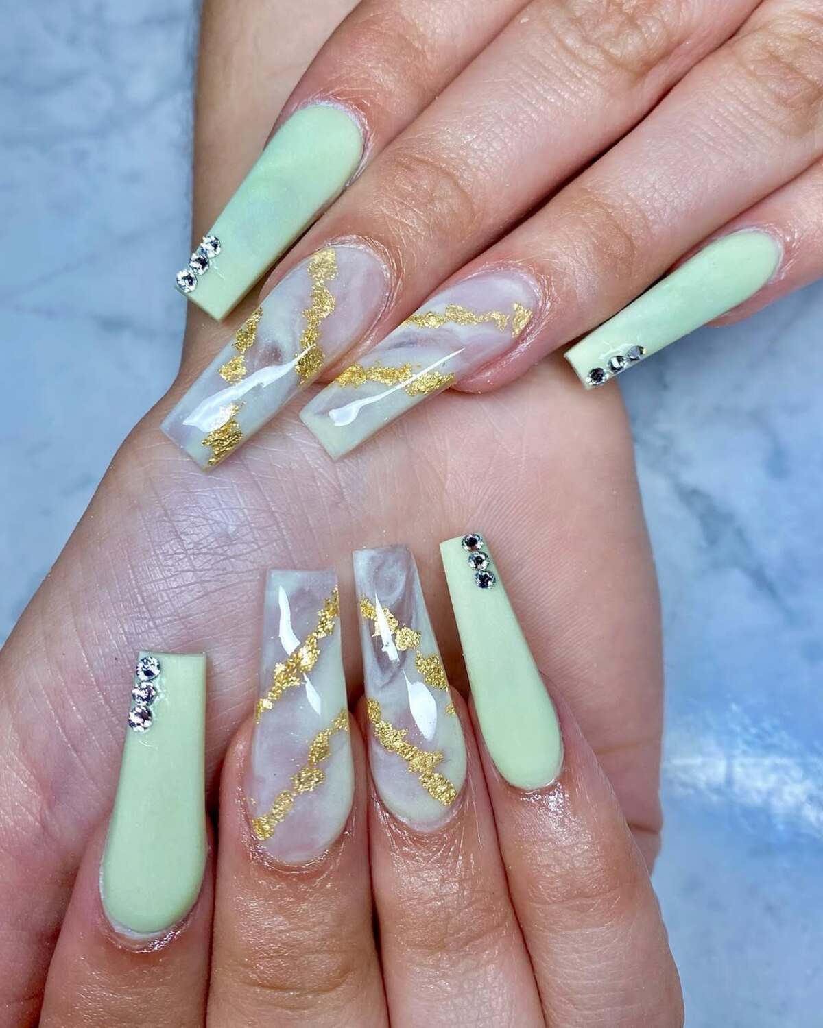 5. Marbled Pastel Green with Luxe Gold Accents