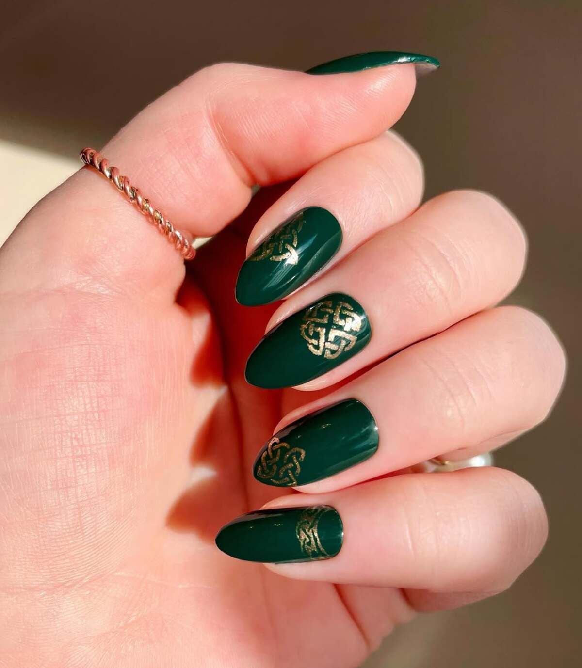 14. Celtic-Inspired Emerald Elegance