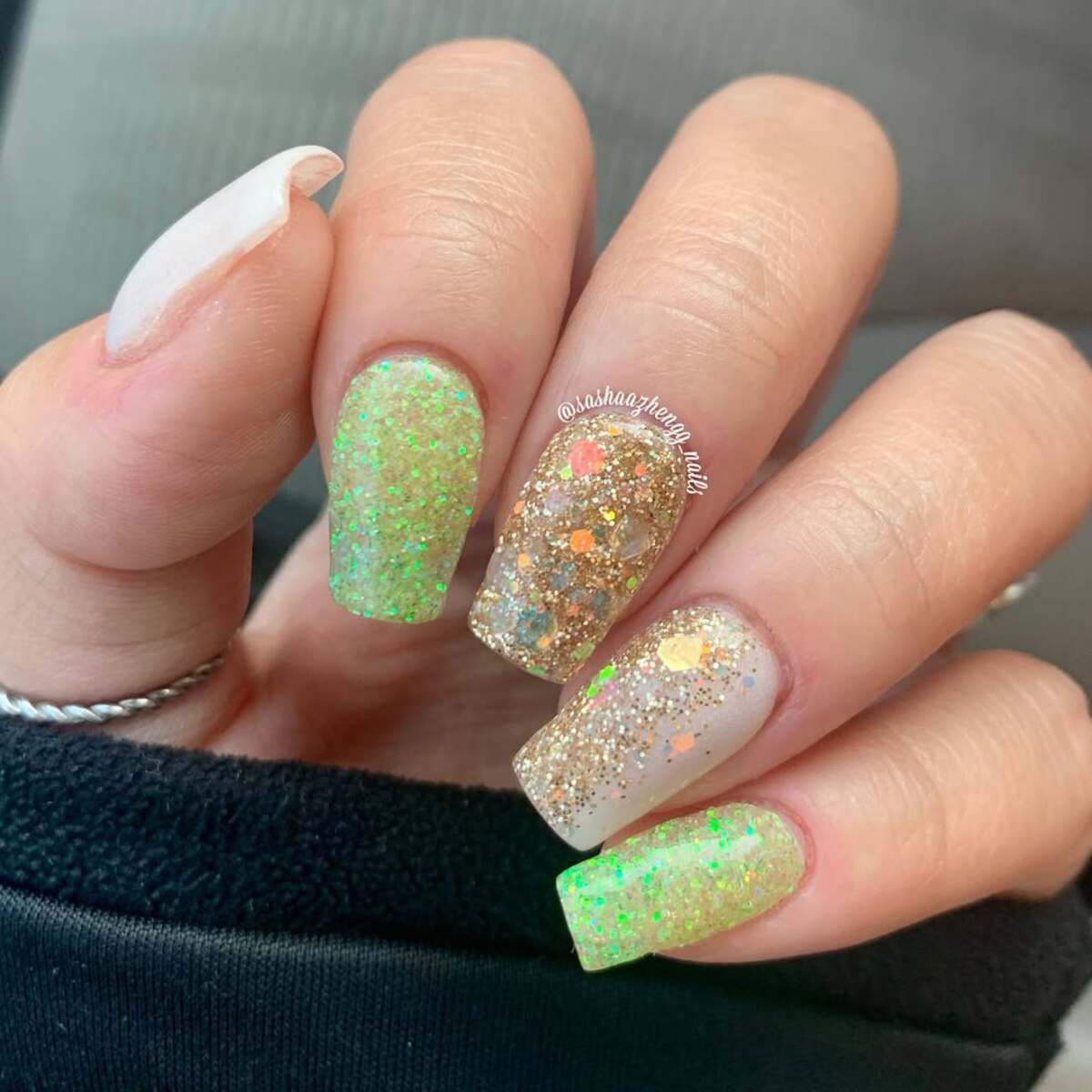 17. Iridescent Green and Gold Glitter Nails