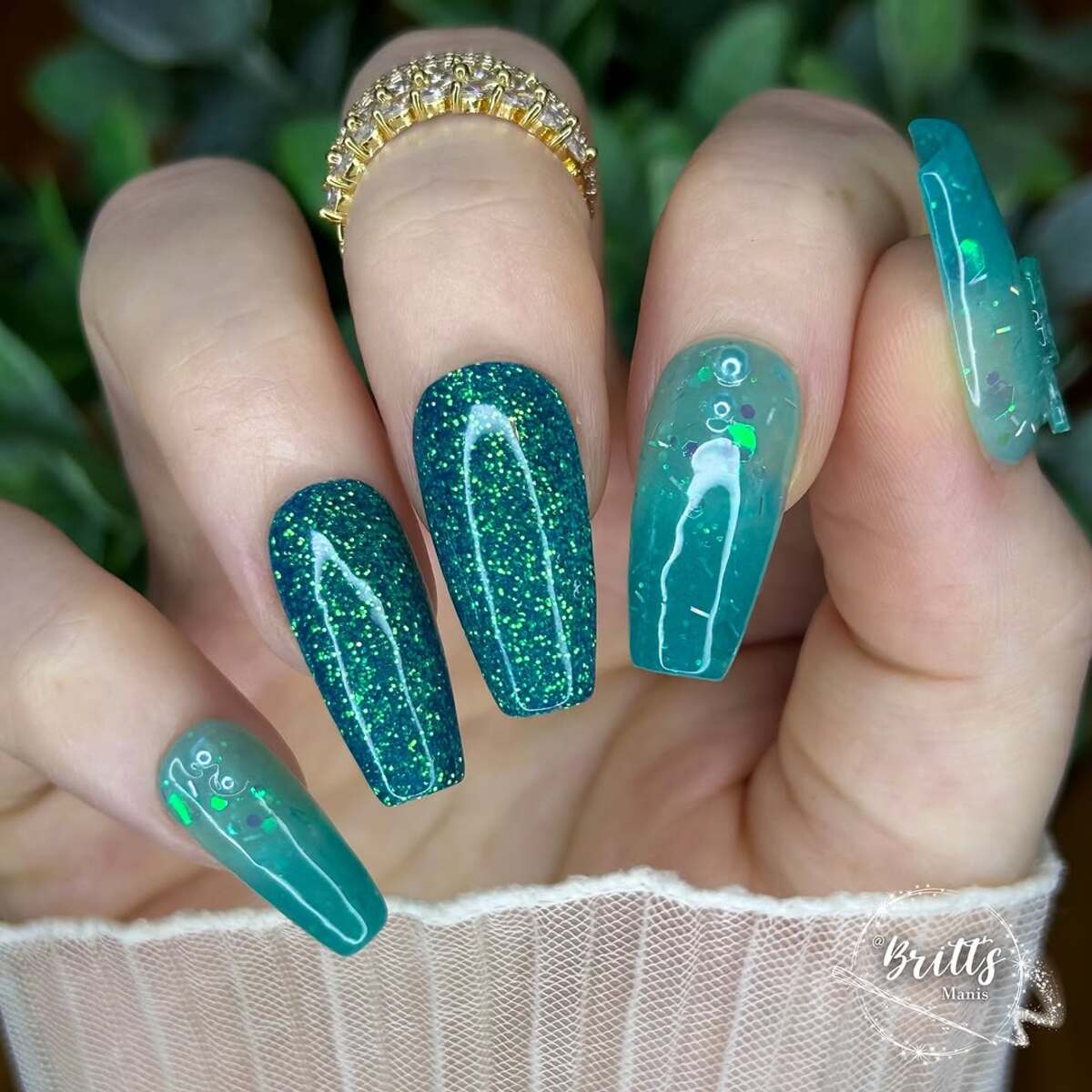 18. Glittery Teal with Shamrock Charms