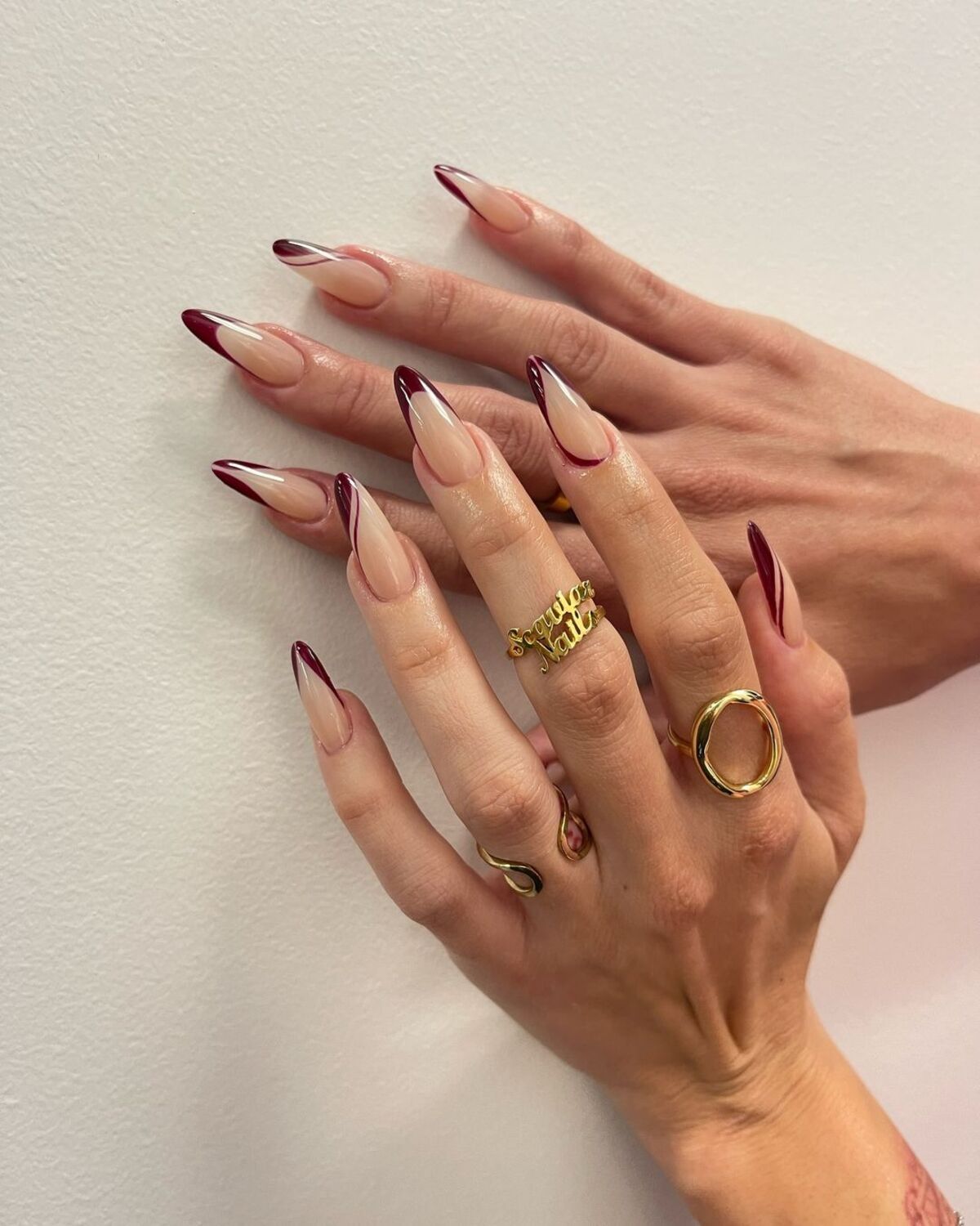 4. Burgundy-Edged Nude Nails