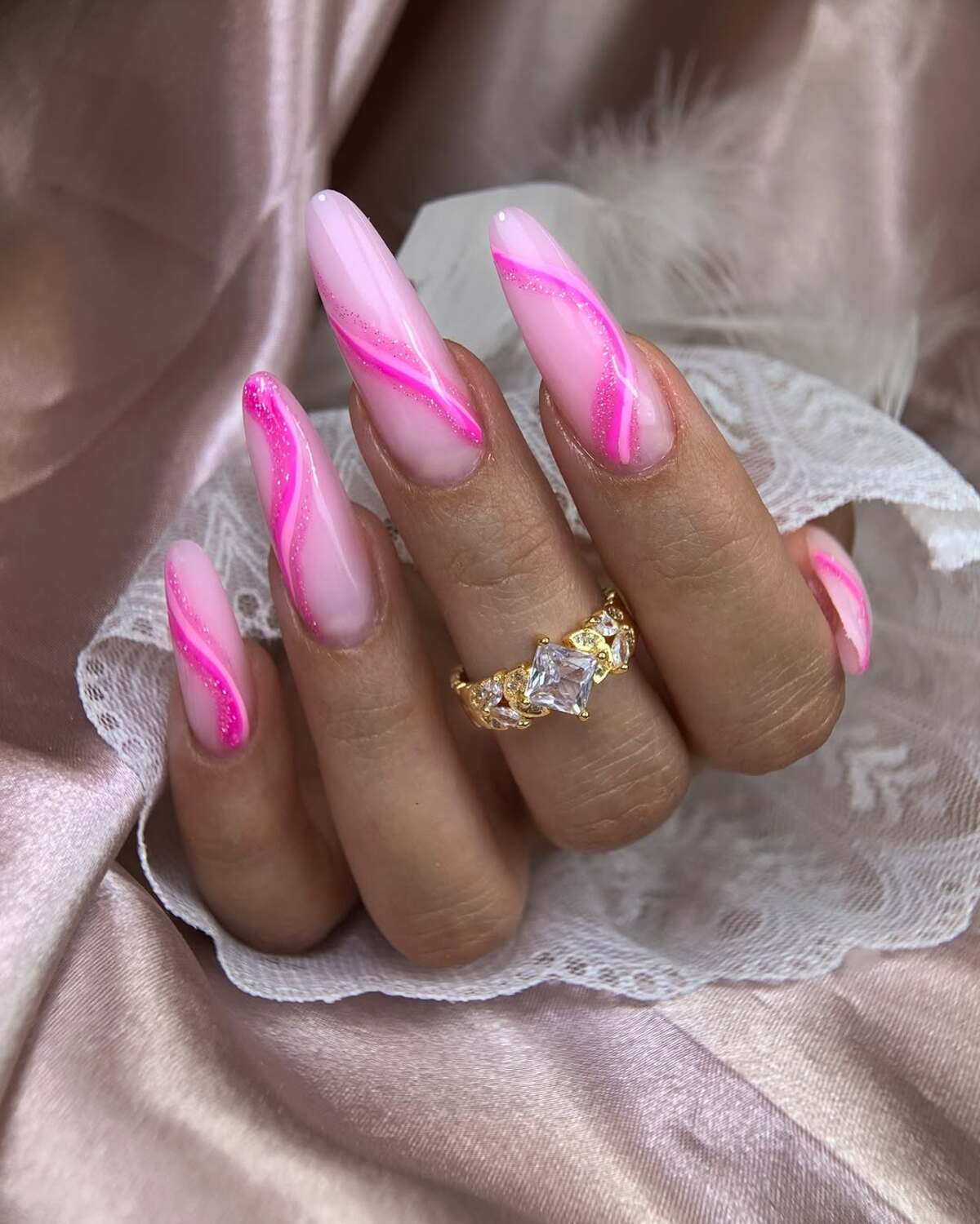 5. Neon Pink Waves on Baby Pink Nails