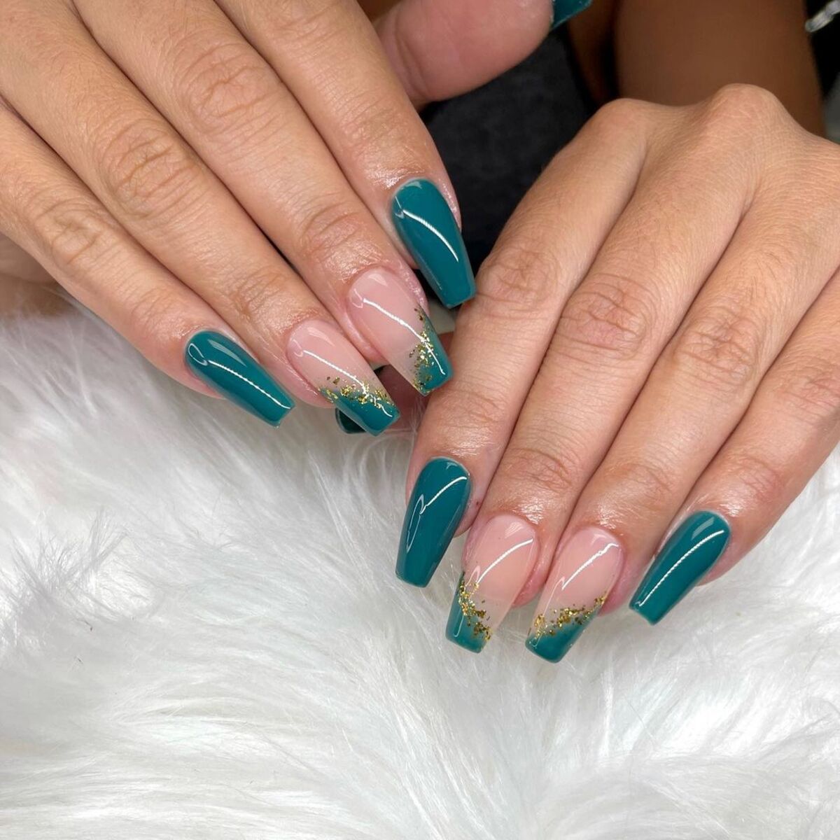 11. Elegant Teal with Gold Glitter Tips