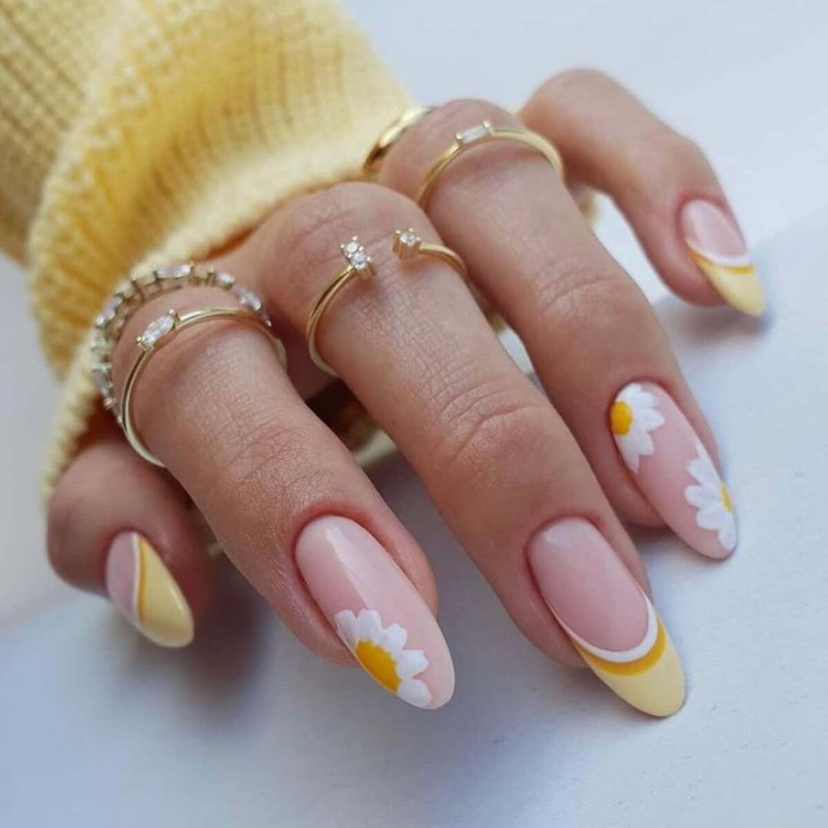 12. Bold Yellow French Tips with Large Daisy Blooms