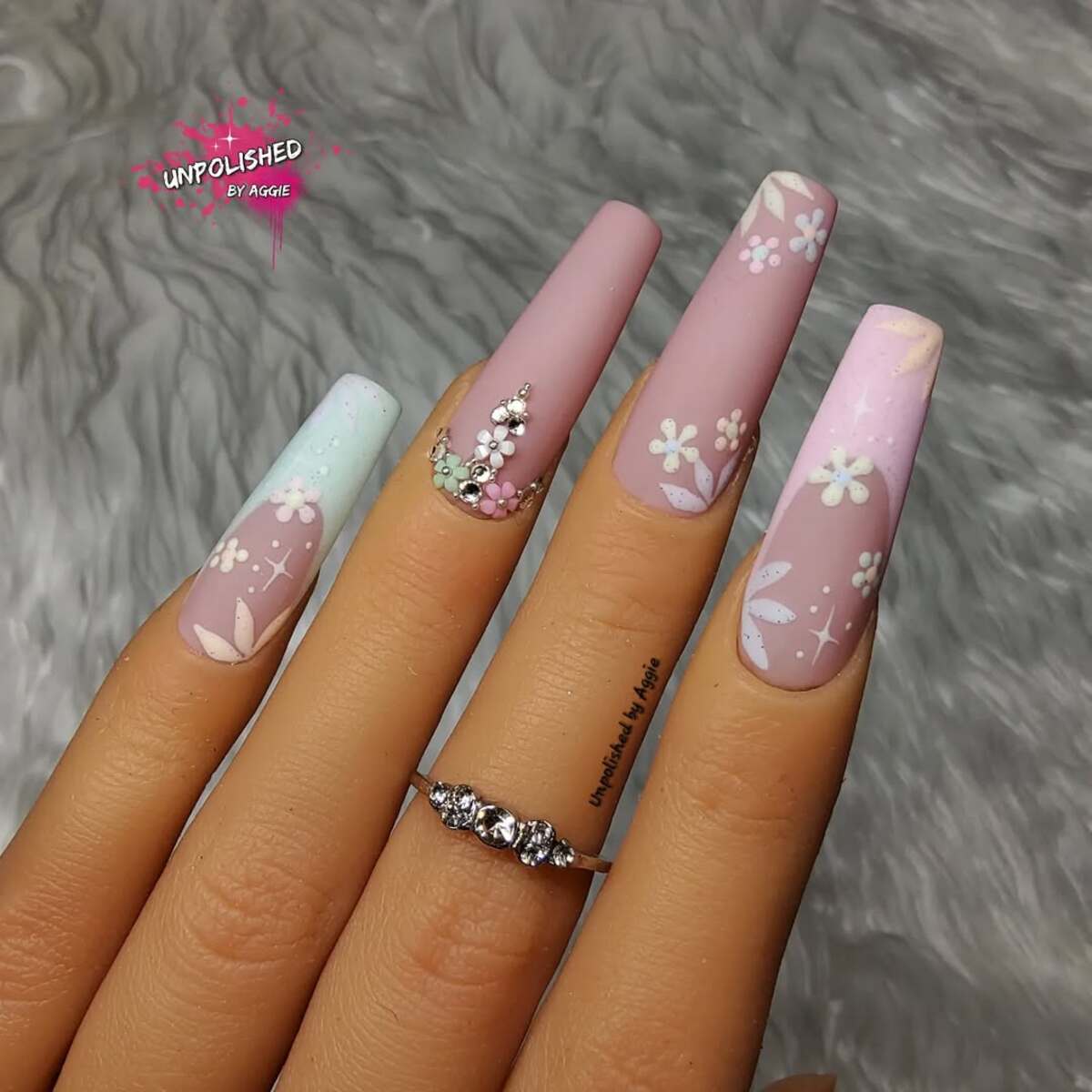 19. Long Pastel Matte Nails with Intricate Floral Art