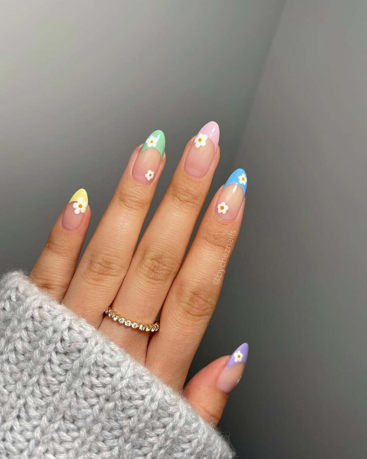 4. Multicolored Pastel Tips with Tiny Floral Accents