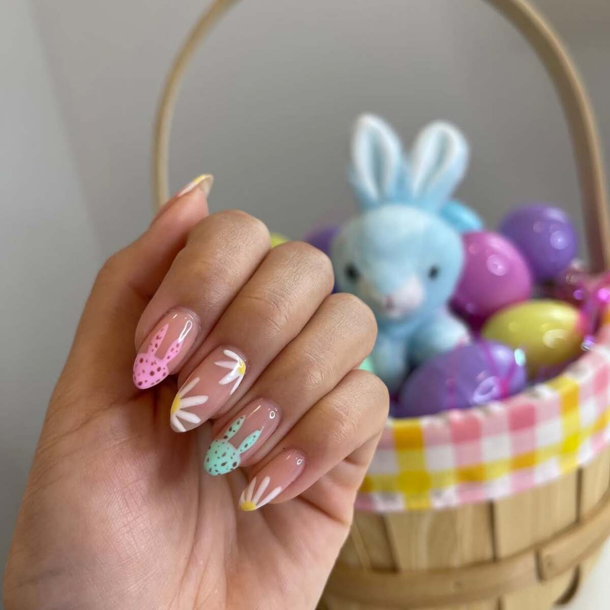 1. Pastel Bunny Charm with Easter Egg Backdrop