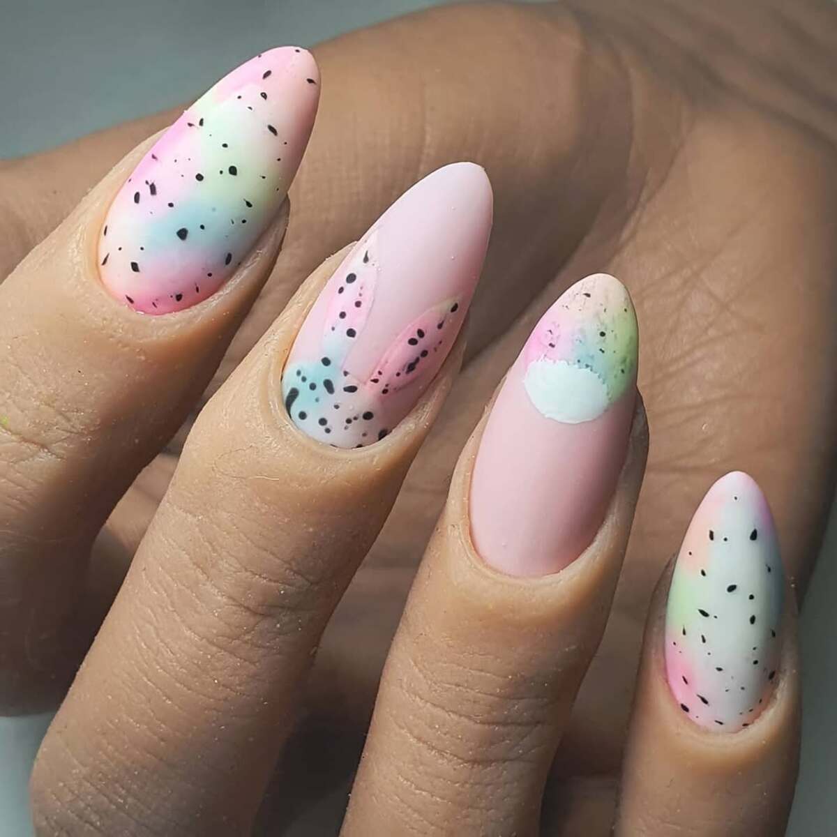 10. Speckled Pastel Ombre with Subtle Bunny Ears