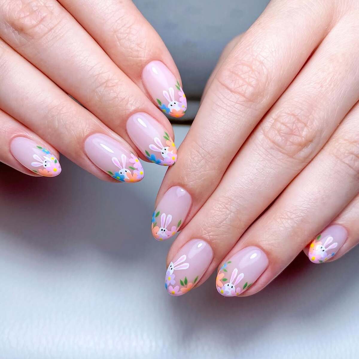 11. Bunny French Tips with Colorful Florals