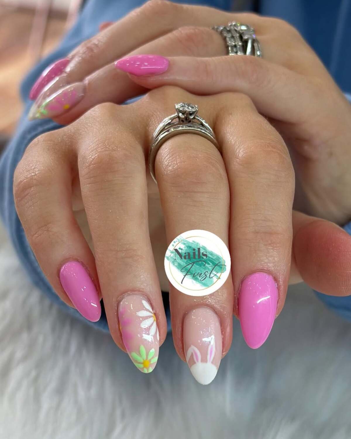 5. Floral Pastel Nails with Subtle Bunny Motifs