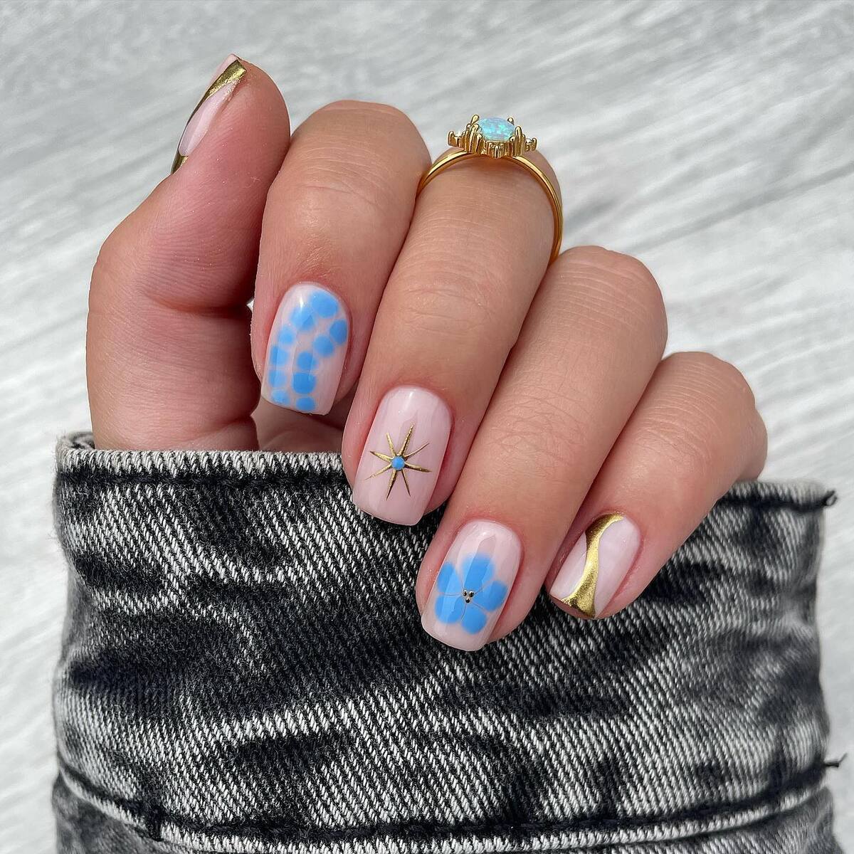 11. Playful Abstract Blue and Gold Designs