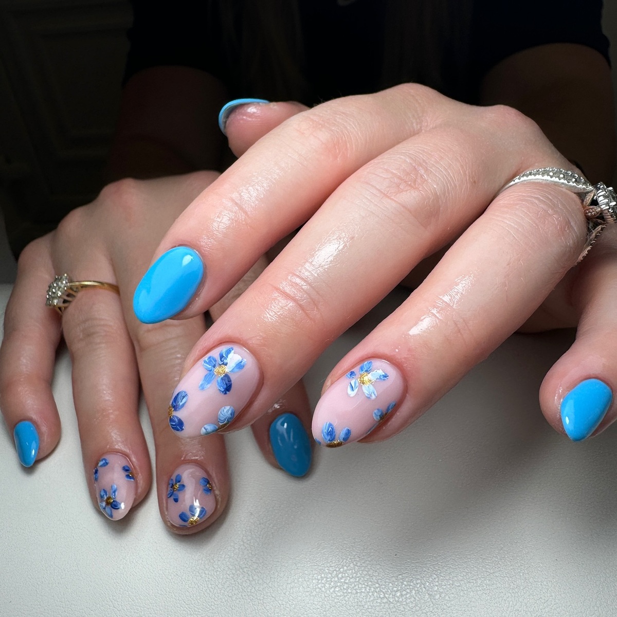 17. Fresh Blue Blooms on Almond Nails