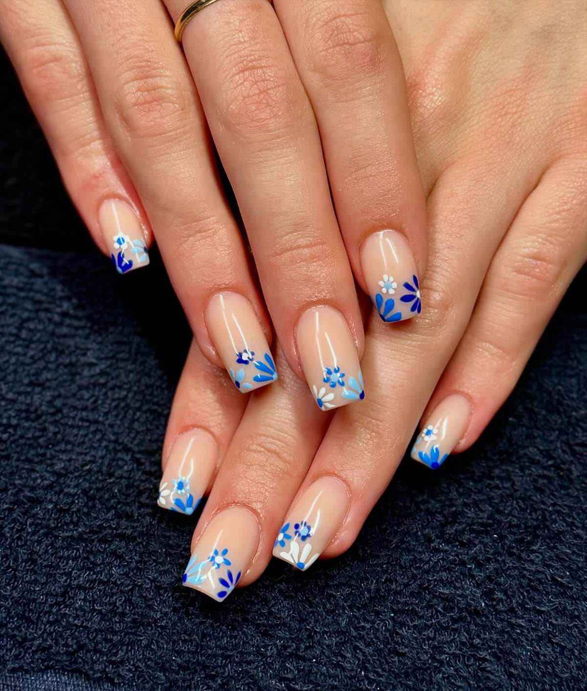 3. Subtle Blue Floral French Tips