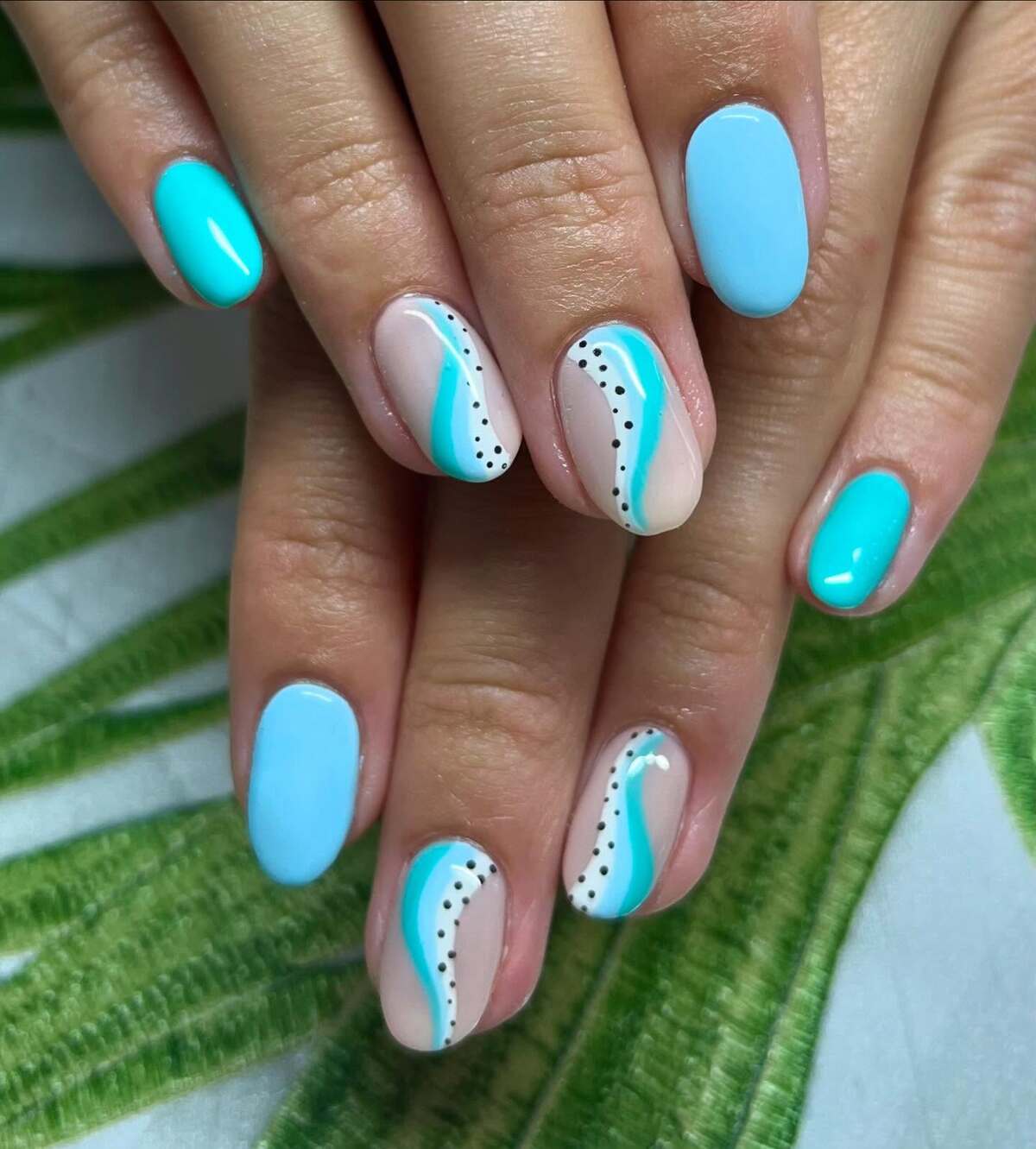 6. Wavy Blue Patterns with Abstract Dots