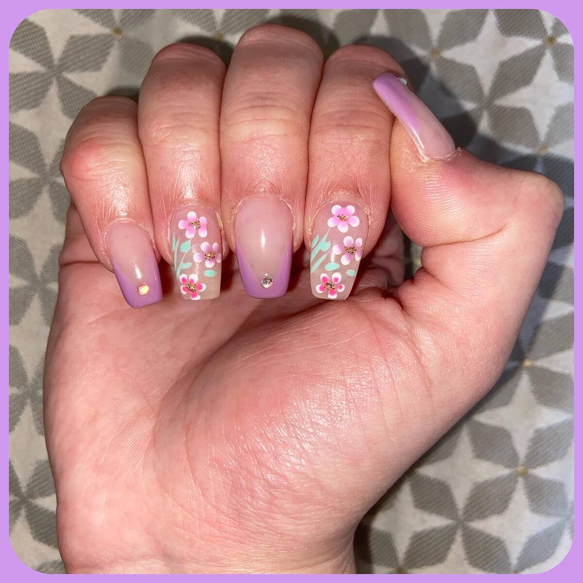 28. Delicate Lavender Tips with Floral Accents