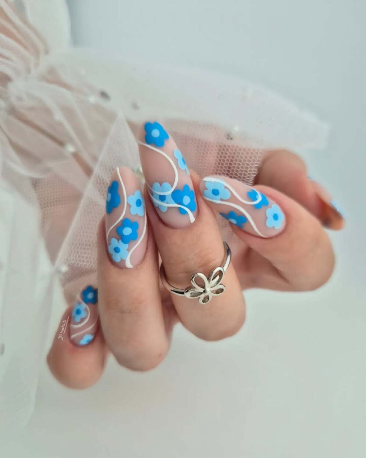 13. Bright Blue Florals with Whimsical Swirls