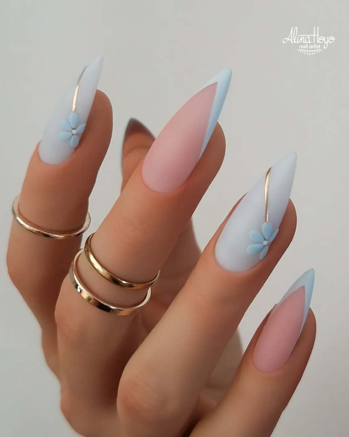 2. Minimalist Nude and Blue with 3D Floral Accent