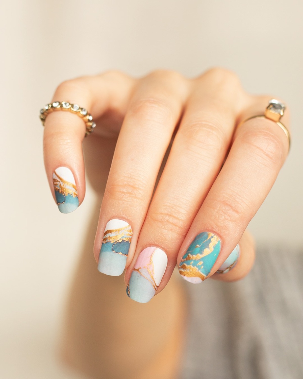 8. Gold-Marble Accents on Pastel Blues