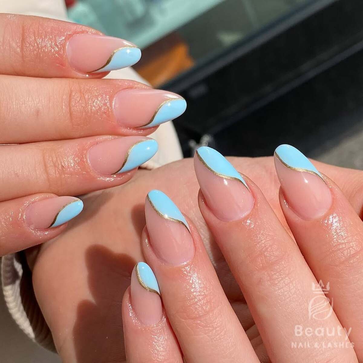 15. Aqua French Tips with Gold Detailing