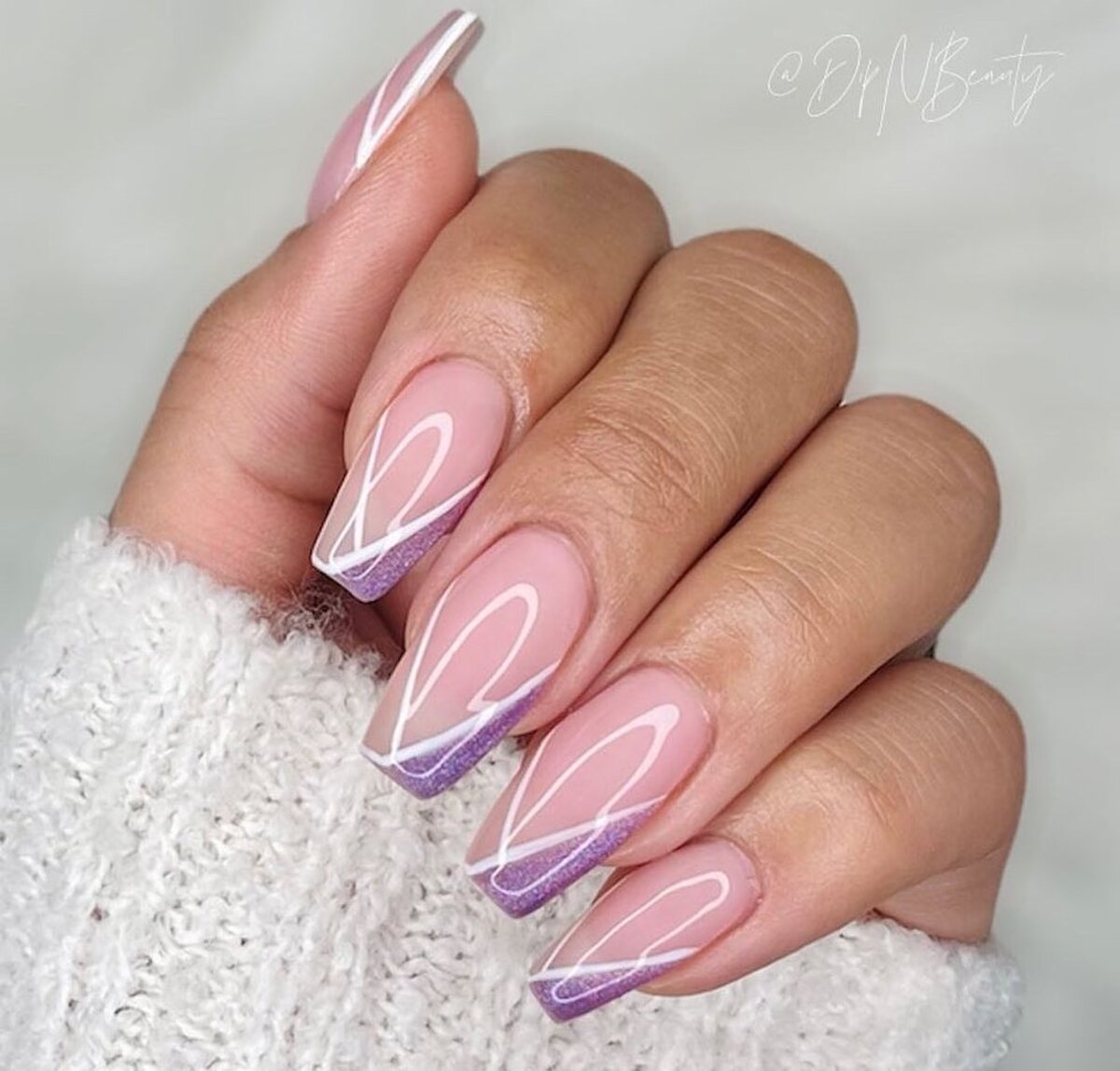 22. Lavender Ombre French Tips with Elegant Swirls