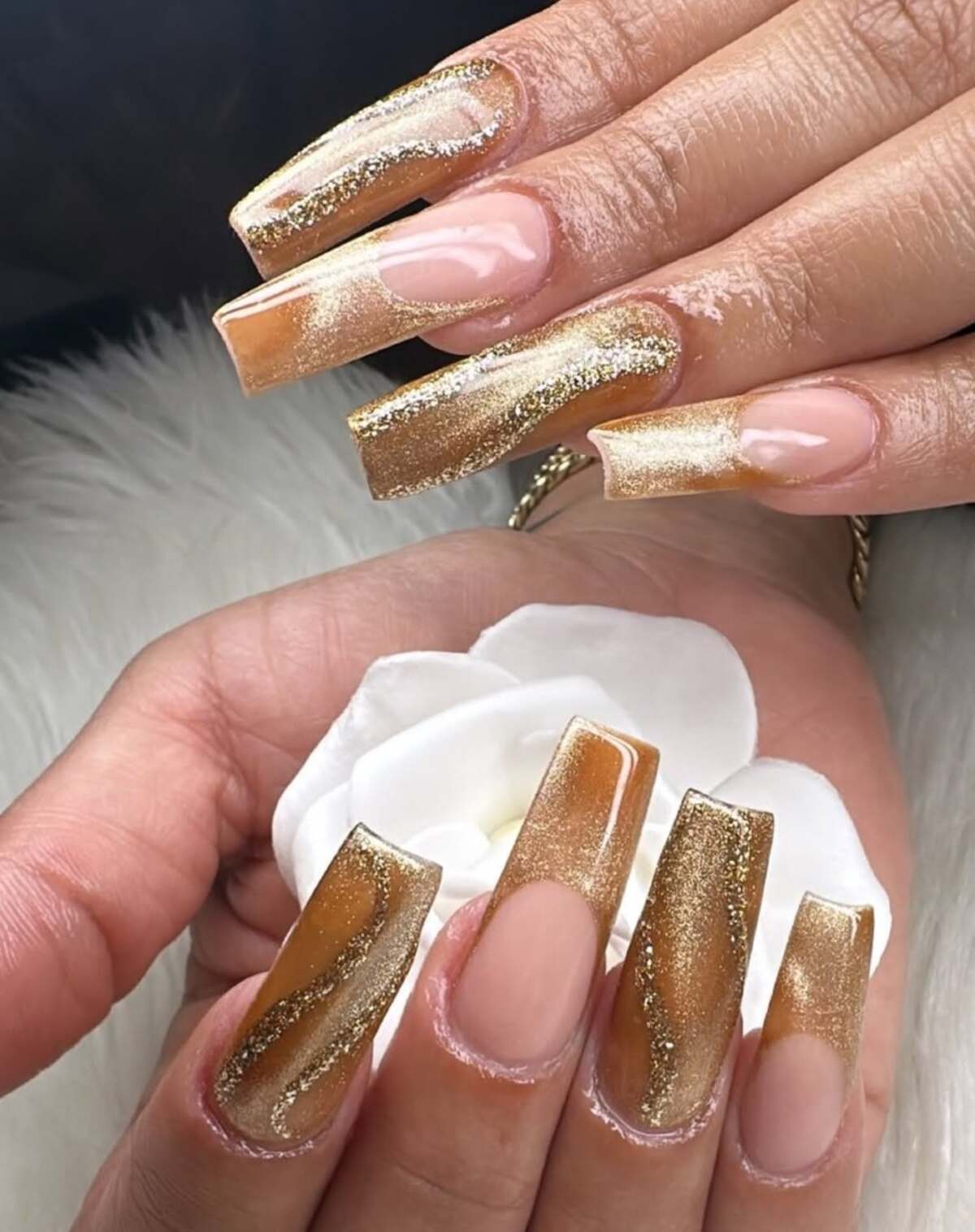 23. Gradient Glitter Gold Coffin Nails