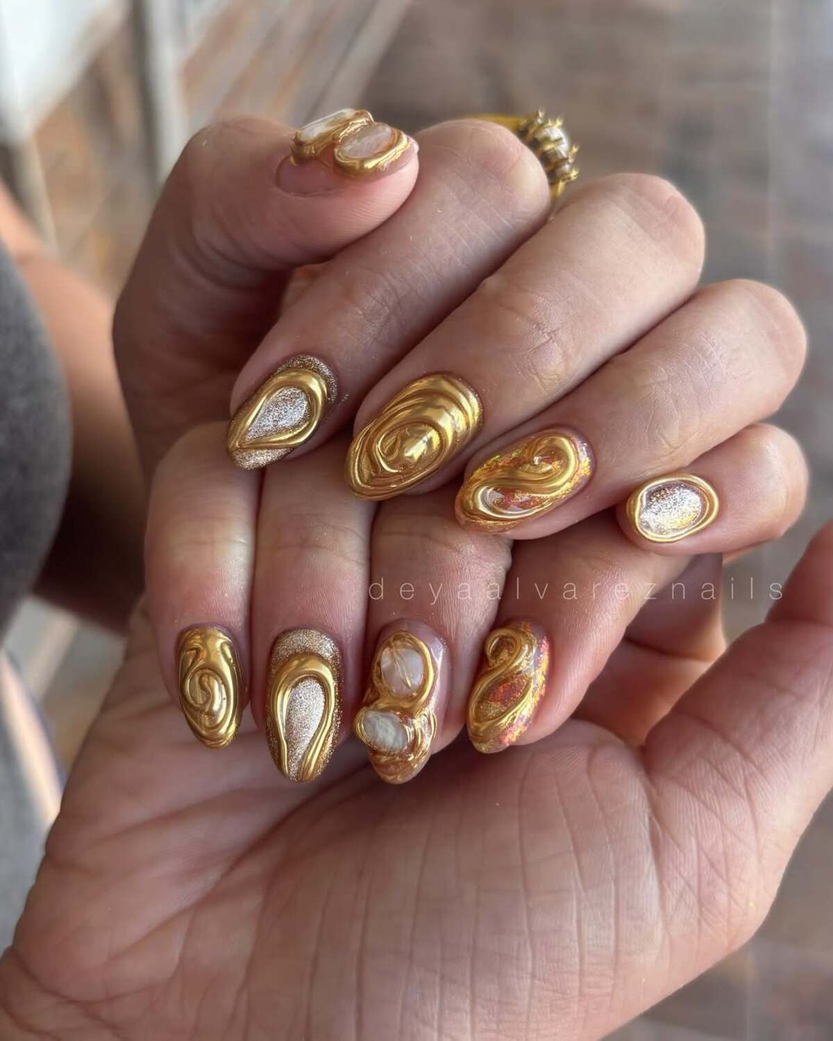 3. Abstract Gold Swirls for Artistic Flair