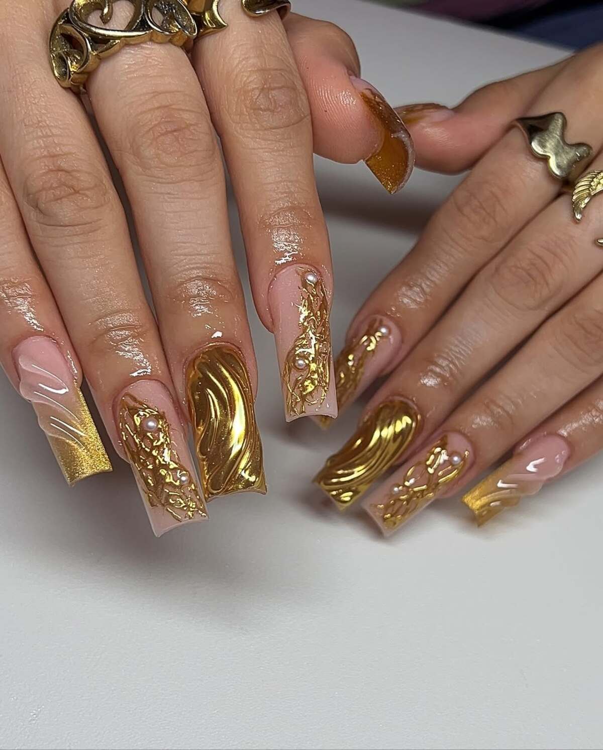 6. Royal Coffin Nails with Ornamental Gold Details